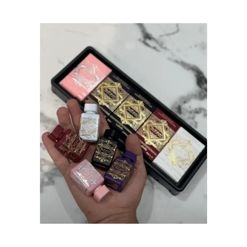 Pack Mini Badee Al Oud Collection Lattafa (6×5 ml) – Miniaturas exclusivas con frascos originales Loweelo